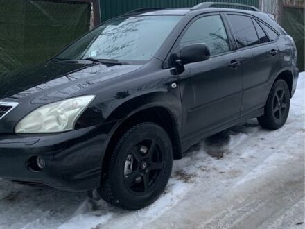 Черный Лексус РХ, объемом двигателя 3.3 л и пробегом 260 тыс. км за 10800 $, фото 1 на Automoto.ua