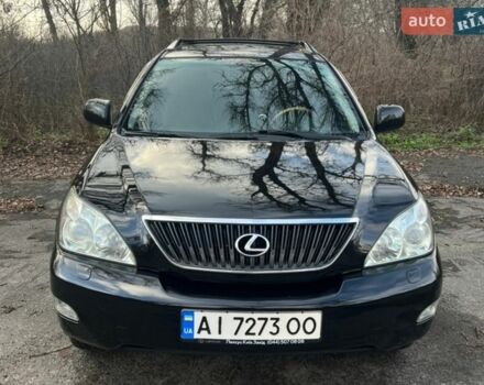 Черный Лексус РХ, объемом двигателя 3.46 л и пробегом 240 тыс. км за 11700 $, фото 1 на Automoto.ua