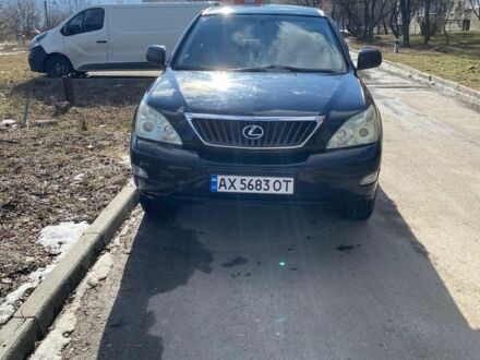 Черный Лексус РХ, объемом двигателя 3.46 л и пробегом 248 тыс. км за 12000 $, фото 1 на Automoto.ua