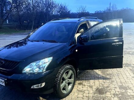 Черный Лексус РХ, объемом двигателя 3.5 л и пробегом 167 тыс. км за 12000 $, фото 1 на Automoto.ua