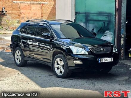 Черный Лексус РХ, объемом двигателя 3.5 л и пробегом 200 тыс. км за 11950 $, фото 1 на Automoto.ua