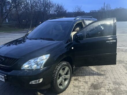 Чорний Лексус РХ, об'ємом двигуна 3.46 л та пробігом 167 тис. км за 11500 $, фото 1 на Automoto.ua