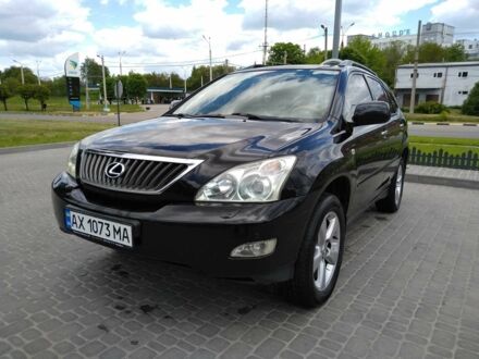 Черный Лексус РХ, объемом двигателя 3.5 л и пробегом 150 тыс. км за 13600 $, фото 1 на Automoto.ua
