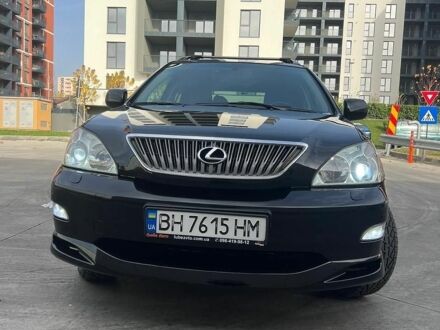 Черный Лексус РХ, объемом двигателя 3.46 л и пробегом 220 тыс. км за 13999 $, фото 1 на Automoto.ua