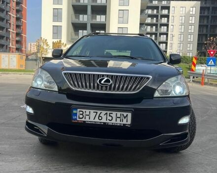 Черный Лексус РХ, объемом двигателя 3.46 л и пробегом 220 тыс. км за 13999 $, фото 1 на Automoto.ua