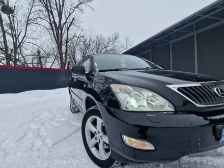 Черный Лексус РХ, объемом двигателя 3.46 л и пробегом 161 тыс. км за 11500 $, фото 1 на Automoto.ua