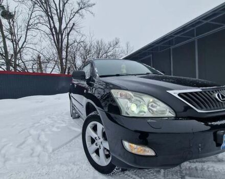 Черный Лексус РХ, объемом двигателя 3.46 л и пробегом 161 тыс. км за 11500 $, фото 1 на Automoto.ua