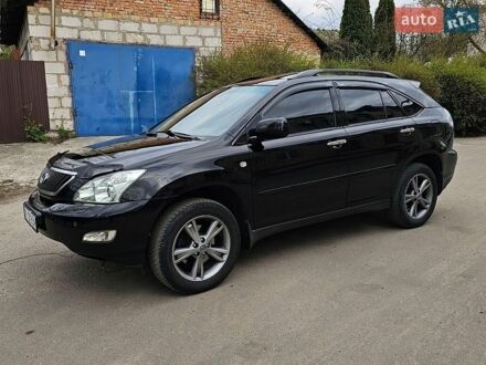 Черный Лексус РХ, объемом двигателя 3.46 л и пробегом 285 тыс. км за 10800 $, фото 1 на Automoto.ua