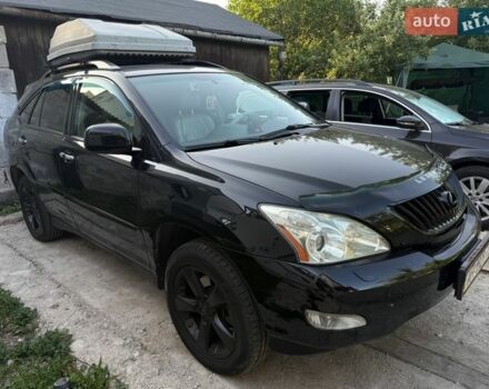 Черный Лексус РХ, объемом двигателя 3.46 л и пробегом 225 тыс. км за 11200 $, фото 1 на Automoto.ua