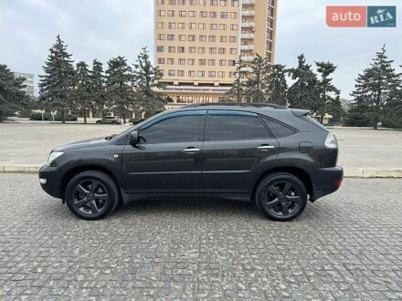 Черный Лексус РХ, объемом двигателя 3.46 л и пробегом 249 тыс. км за 9500 $, фото 1 на Automoto.ua