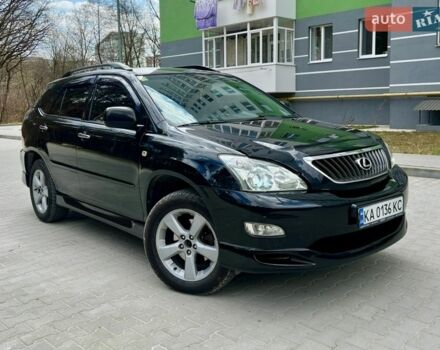 Черный Лексус РХ, объемом двигателя 3.5 л и пробегом 260 тыс. км за 12500 $, фото 1 на Automoto.ua