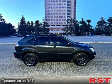 Черный Лексус РХ, объемом двигателя 3.5 л и пробегом 247 тыс. км за 9999 $, фото 1 на Automoto.ua