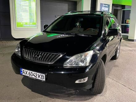 Черный Лексус РХ, объемом двигателя 3.5 л и пробегом 200 тыс. км за 12500 $, фото 1 на Automoto.ua