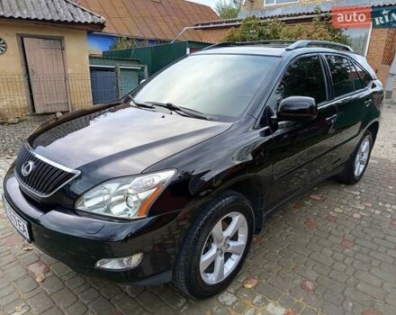Черный Лексус РХ, объемом двигателя 3.46 л и пробегом 367 тыс. км за 10900 $, фото 1 на Automoto.ua