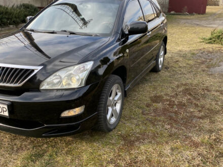 Чорний Лексус РХ, об'ємом двигуна 3.46 л та пробігом 167 тис. км за 13800 $, фото 1 на Automoto.ua