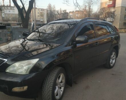 Черный Лексус РХ, объемом двигателя 3.5 л и пробегом 285 тыс. км за 8400 $, фото 1 на Automoto.ua