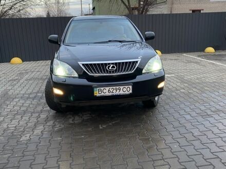 Черный Лексус РХ, объемом двигателя 3.5 л и пробегом 245 тыс. км за 10500 $, фото 1 на Automoto.ua