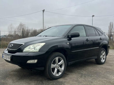 Черный Лексус РХ, объемом двигателя 3.46 л и пробегом 195 тыс. км за 12000 $, фото 1 на Automoto.ua