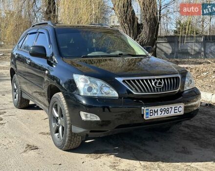 Черный Лексус РХ, объемом двигателя 3.3 л и пробегом 269 тыс. км за 11788 $, фото 1 на Automoto.ua