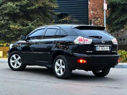 Черный Лексус РХ, объемом двигателя 3.5 л и пробегом 233 тыс. км за 11499 $, фото 1 на Automoto.ua