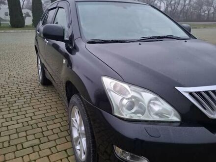 Черный Лексус РХ, объемом двигателя 3.46 л и пробегом 260 тыс. км за 11000 $, фото 1 на Automoto.ua