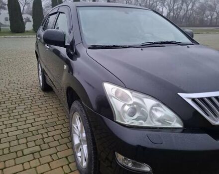 Черный Лексус РХ, объемом двигателя 3.46 л и пробегом 260 тыс. км за 11000 $, фото 1 на Automoto.ua