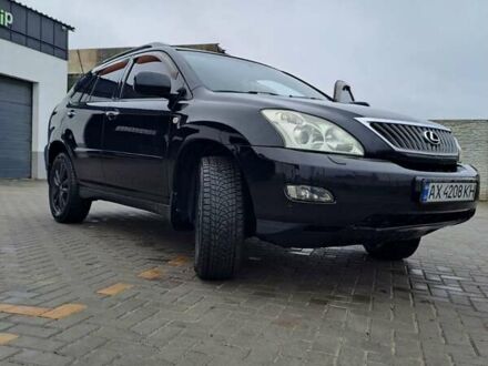 Черный Лексус РХ, объемом двигателя 3.46 л и пробегом 270 тыс. км за 9700 $, фото 1 на Automoto.ua