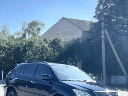 Черный Лексус РХ, объемом двигателя 3.46 л и пробегом 277 тыс. км за 9300 $, фото 1 на Automoto.ua