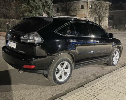 Черный Лексус РХ, объемом двигателя 3.5 л и пробегом 265 тыс. км за 10500 $, фото 1 на Automoto.ua