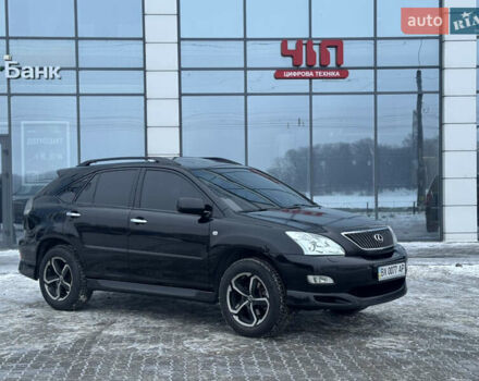 Черный Лексус РХ, объемом двигателя 3.46 л и пробегом 195 тыс. км за 11950 $, фото 1 на Automoto.ua
