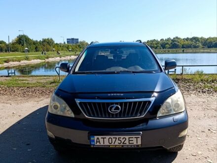 Черный Лексус РХ, объемом двигателя 3.46 л и пробегом 186 тыс. км за 12500 $, фото 1 на Automoto.ua