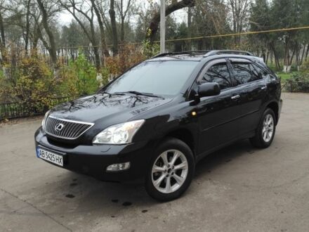 Черный Лексус РХ, объемом двигателя 3.5 л и пробегом 242 тыс. км за 9900 $, фото 1 на Automoto.ua