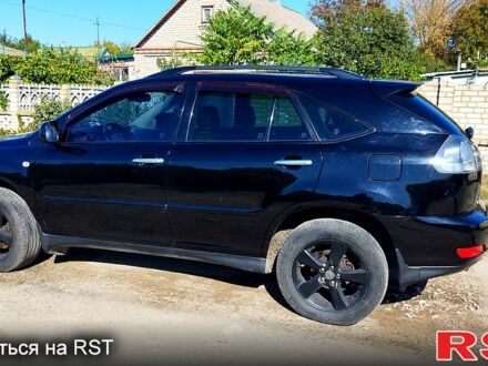 Черный Лексус РХ, объемом двигателя 3.5 л и пробегом 264 тыс. км за 12860 $, фото 1 на Automoto.ua