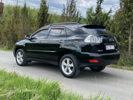 Черный Лексус РХ, объемом двигателя 3.3 л и пробегом 248 тыс. км за 12500 $, фото 1 на Automoto.ua