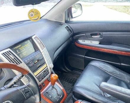 Красный Лексус РХ, объемом двигателя 3.5 л и пробегом 218 тыс. км за 9500 $, фото 2 на Automoto.ua