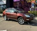 Красный Лексус РХ, объемом двигателя 3.46 л и пробегом 155 тыс. км за 15990 $, фото 1 на Automoto.ua