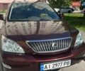 Красный Лексус РХ, объемом двигателя 3.5 л и пробегом 251 тыс. км за 13000 $, фото 1 на Automoto.ua