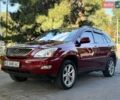 Красный Лексус РХ, объемом двигателя 3.5 л и пробегом 255 тыс. км за 10899 $, фото 1 на Automoto.ua