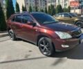 Красный Лексус РХ, объемом двигателя 3.5 л и пробегом 251 тыс. км за 13000 $, фото 1 на Automoto.ua