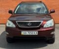 Красный Лексус РХ, объемом двигателя 3.5 л и пробегом 236 тыс. км за 11200 $, фото 1 на Automoto.ua