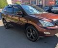 Красный Лексус РХ, объемом двигателя 3.5 л и пробегом 251 тыс. км за 13000 $, фото 2 на Automoto.ua