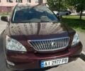 Красный Лексус РХ, объемом двигателя 3.5 л и пробегом 251 тыс. км за 11100 $, фото 1 на Automoto.ua