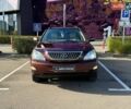 Красный Лексус РХ, объемом двигателя 3.46 л и пробегом 155 тыс. км за 15990 $, фото 1 на Automoto.ua