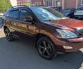 Красный Лексус РХ, объемом двигателя 3.5 л и пробегом 251 тыс. км за 11100 $, фото 1 на Automoto.ua