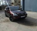 Красный Лексус РХ, объемом двигателя 3.5 л и пробегом 206 тыс. км за 14900 $, фото 2 на Automoto.ua