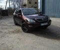 Красный Лексус РХ, объемом двигателя 3.5 л и пробегом 206 тыс. км за 14900 $, фото 1 на Automoto.ua