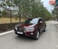 Красный Лексус РХ, объемом двигателя 3.5 л и пробегом 170 тыс. км за 19500 $, фото 1 на Automoto.ua