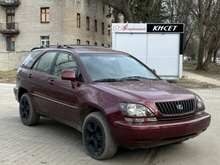 Красный Лексус РХ, объемом двигателя 3 л и пробегом 260 тыс. км за 5300 $, фото 1 на Automoto.ua