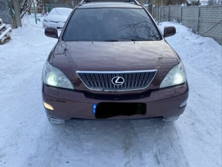 Красный Лексус РХ, объемом двигателя 3.5 л и пробегом 218 тыс. км за 9500 $, фото 1 на Automoto.ua