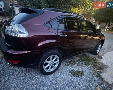 Красный Лексус РХ, объемом двигателя 3.46 л и пробегом 167 тыс. км за 10800 $, фото 1 на Automoto.ua